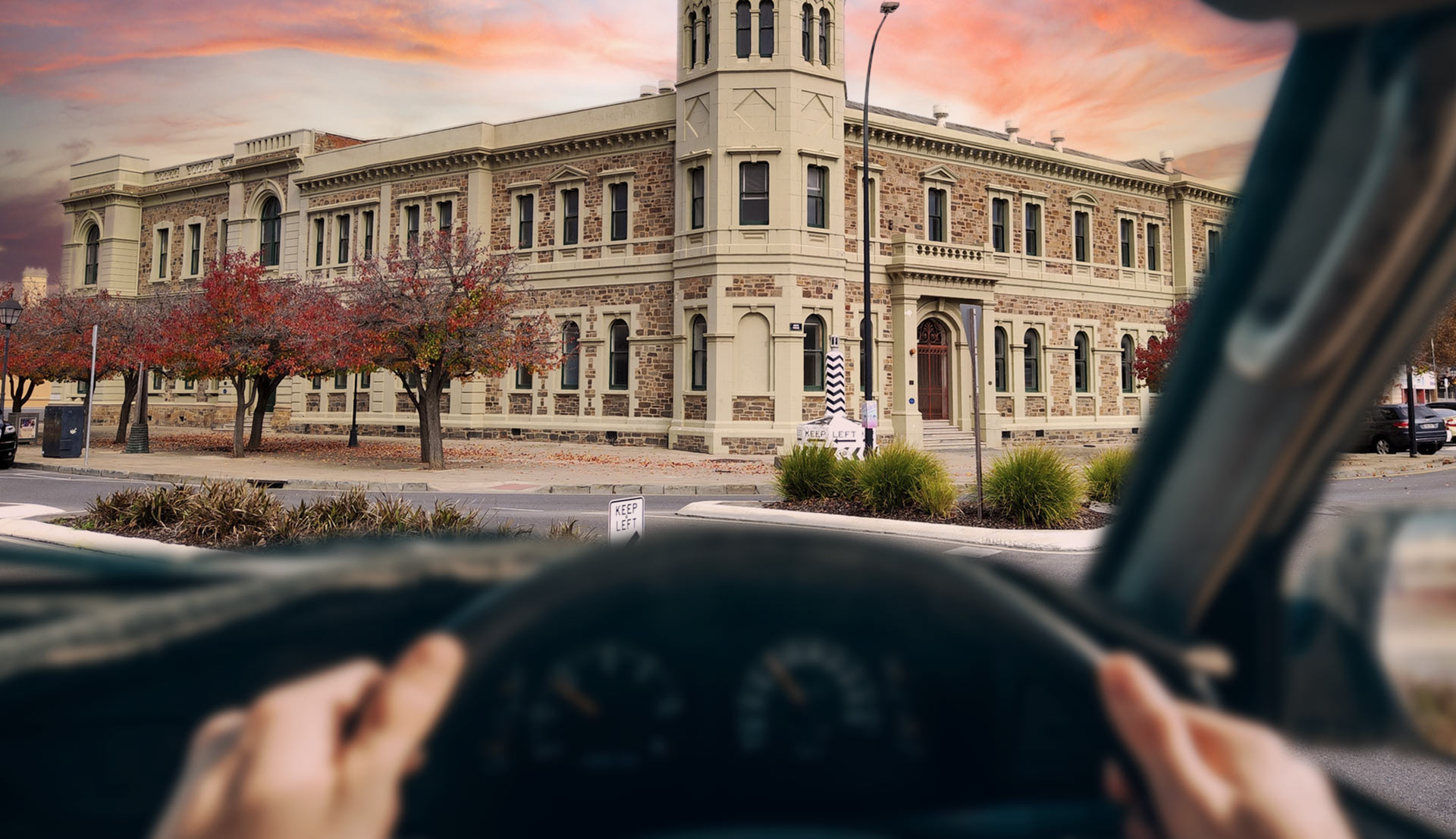 A person drives their car through Port Adelaide